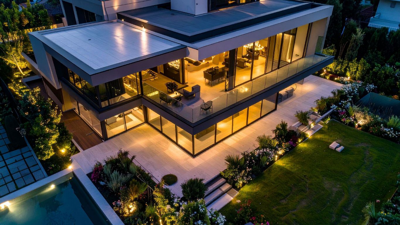 A striking modern home at dusk